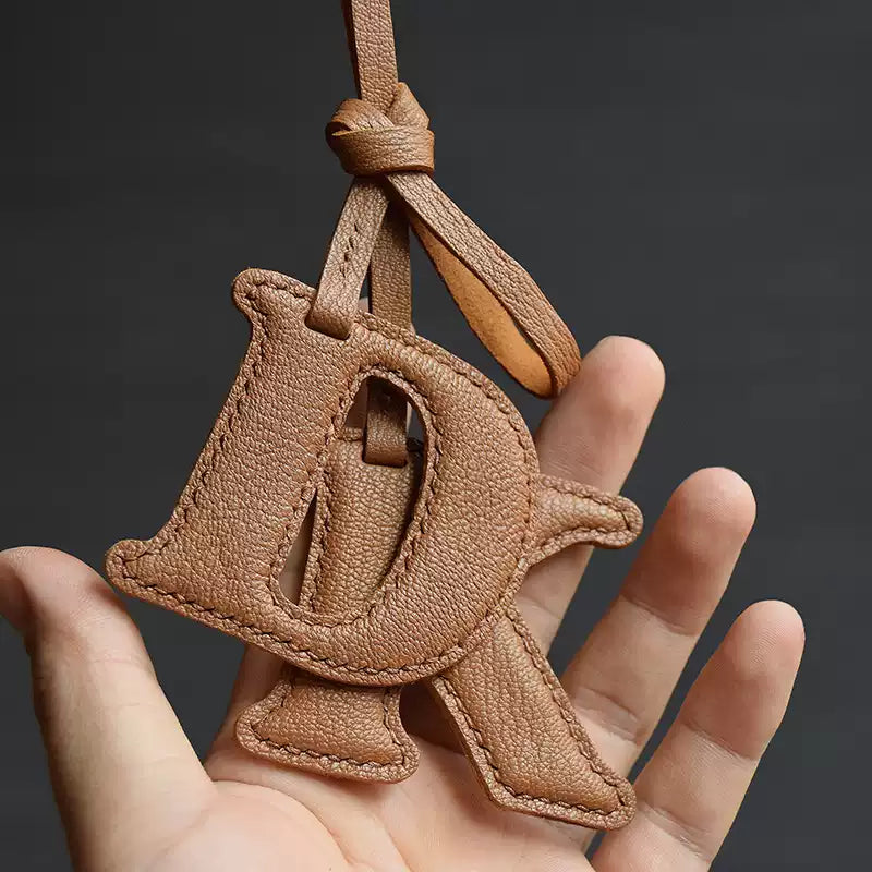 Bag Charm Letra